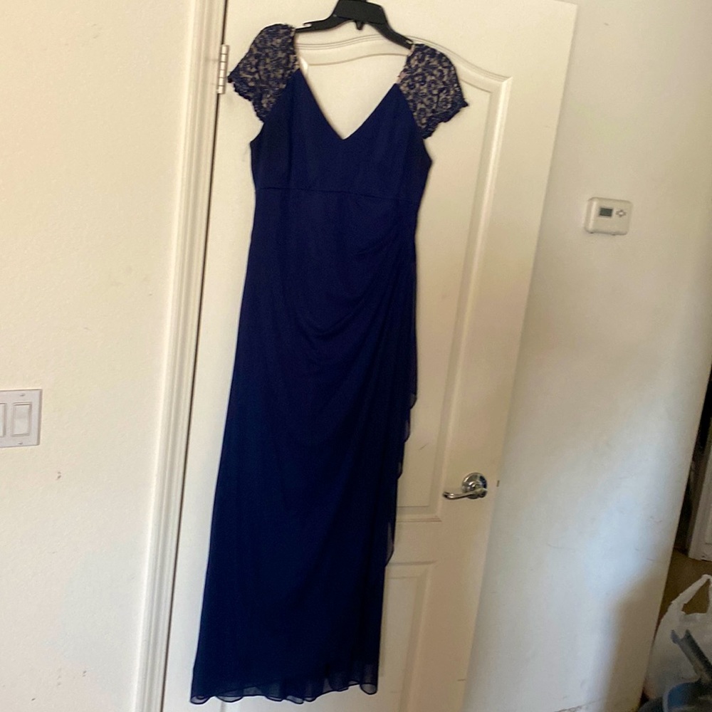Party dress color is Navy blue